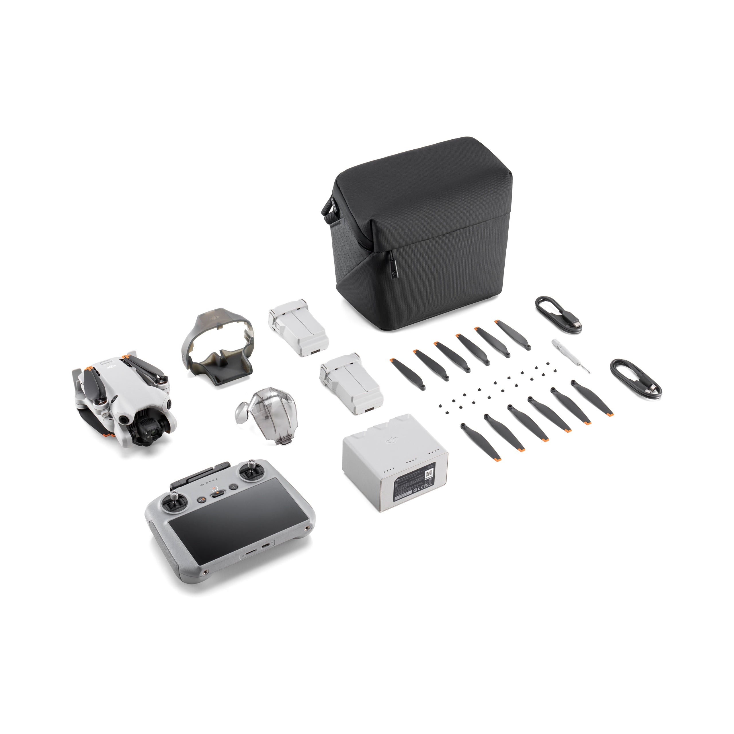 DJI MINI 4 PRO DJI RC 2 FLY MORE COMBO PLUS UP RIGHT VIEW WHITE BOARD BACKGROUND