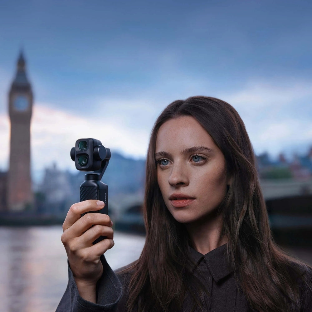 DJI Osmo Pocket 4P Dual-Camera Pocket Gimbal, 1-Inch Sensor, 60mm 3x Zoom, black,Woman holding a camera with Big Ben in the background