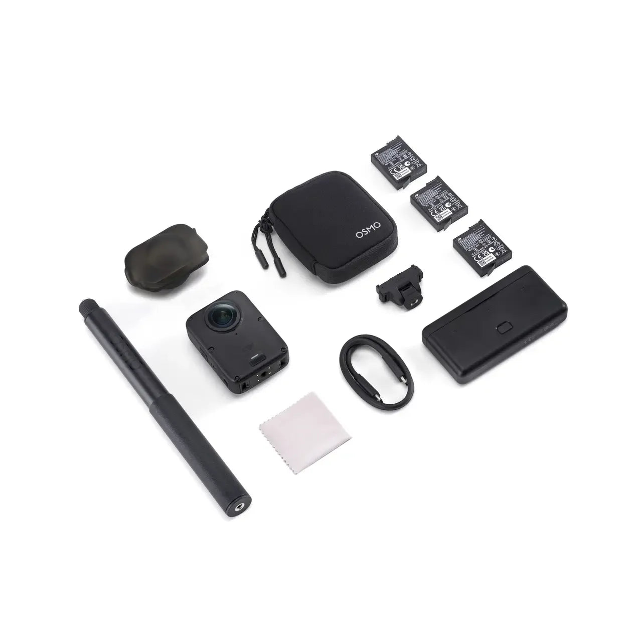 DJI OSMO 360 II 2 MARK 2, ADVENTURE COMBO, An action camera kit laid out on a white background, including a black action camera, a black selfie stick, a black zippered case, three battery packs, a small black accessory, a rectangular battery or charger, a black strap, a light gray microfiber cloth, and a small black pouch.